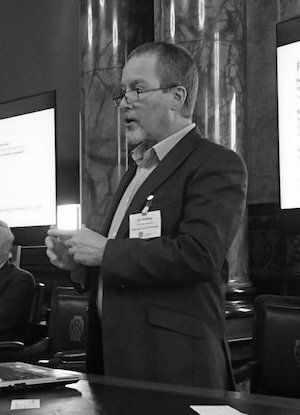 Eric Holliday speaking at an event